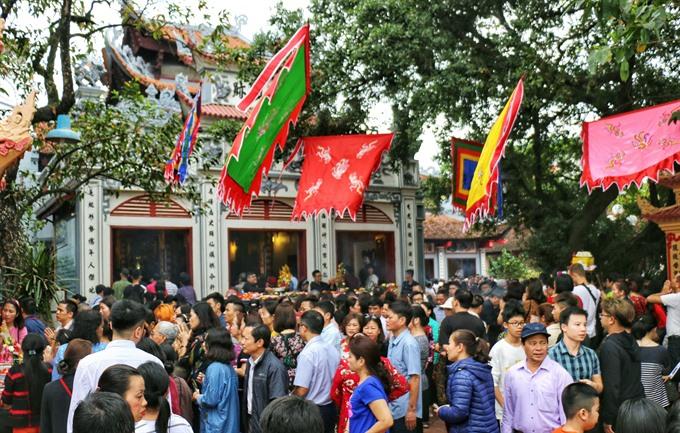 Visiting pagodas during Tết